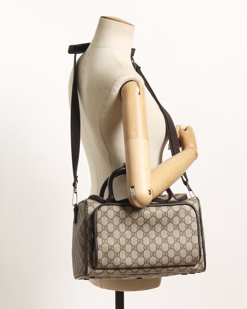 Gucci   |    Supreme Crossbody Bag