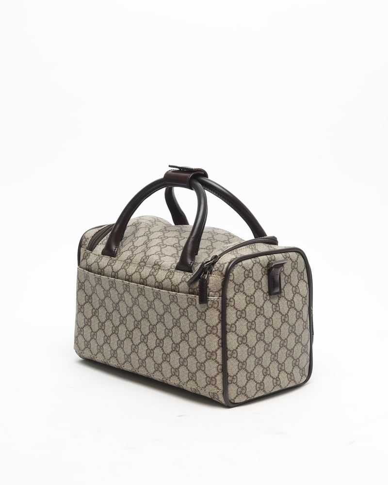 Gucci   |    Supreme Crossbody Bag