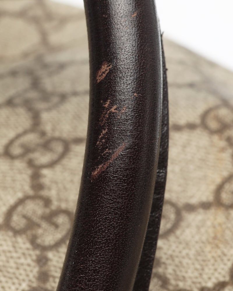 Gucci   |    Supreme Crossbody Bag