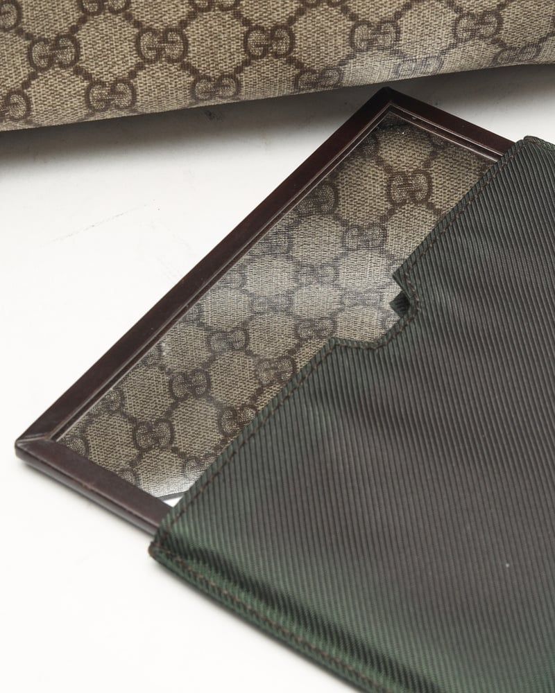 Gucci   |    Supreme Crossbody Bag